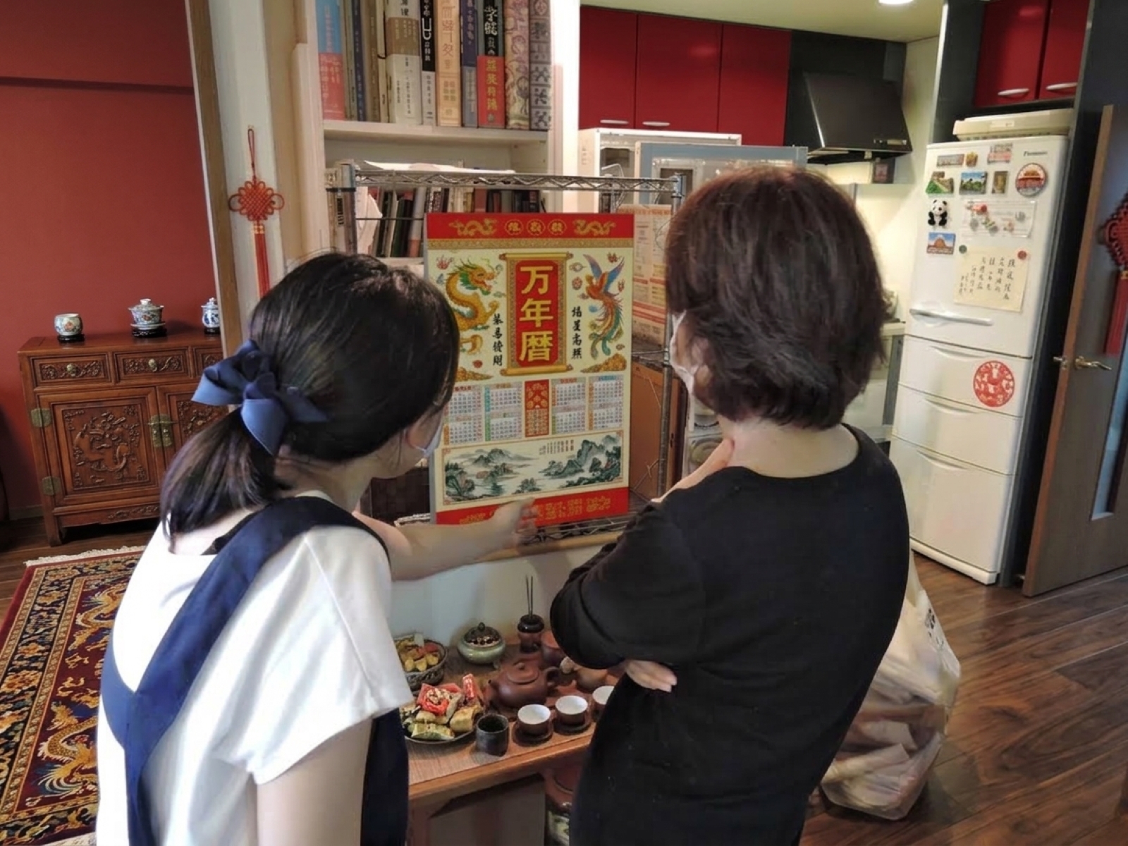 ご家庭でスタッフと相談する様子